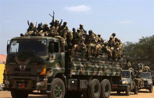 SPLA soldiers drive in a truck in Juba December 21, 2013. REUTERS/Stringer