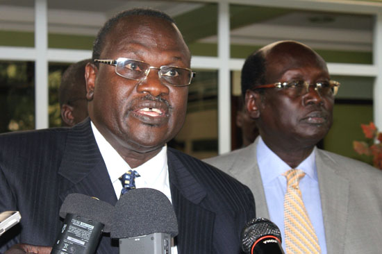 Former Vice president, Riek Machar with Dr. Marial Benjamin, the foreign minister, announcing the death of George Author in 2011(Photo: via weak leaks)