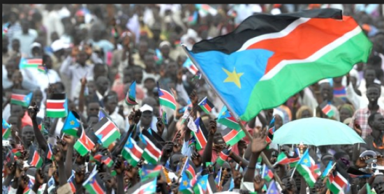 Tens of thousands of South Sudanese have watched the raising of the new country's flag at an independence ceremony in the capital, Juba.(Photo: Reutrers)