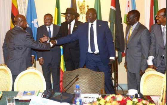 Ugandan President, Yoweri Museveni, greets Dr. Riek Machar of SPLM/SPLA after negotiating the withdrawal of his troops in South Sudan(Photo: supplied)