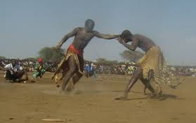 A wrestling contest between Twic East county against Gok-Athooc County in South Sudan capital, Juba, 2010 (Photo: via Borglobe.com) 