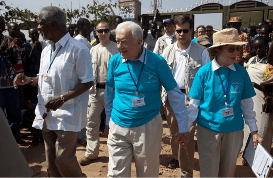 Former U.S. President Jimmy Carter, his wife, Rosalynn, and former UN Secretary General Kofi Annan conclude a visit to a polling center the southern capital of Juba Sunday, Jan. 9, 2011. (AP Photo/Pete Muller) 