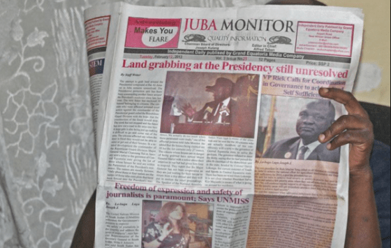 A person reads the Juba Monitor on the day the paper ran the story about the U.N. Mission in South Sudan's (UNMISS) Plan of Action on the Safety of Journalists. South Sudan has agreed to test drive the plan, which calls for defamation to be decriminalized(Photo: via VOA)