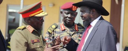South Sudan President Kiir Mayardiit chats with Paul Malong, the former governor of Northern Bahr el Ghazal, at Juba airport(Photo: via Radio Tamazuj)