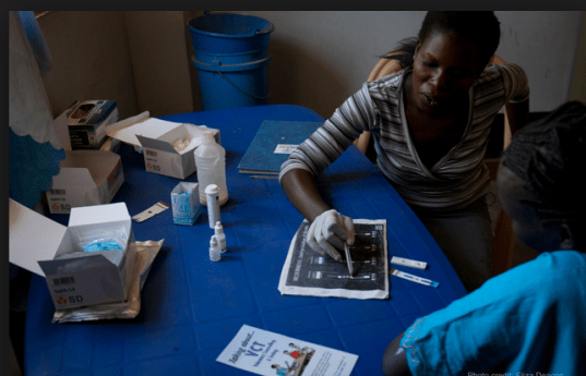 Nurse at Juba Teaching Hospital consulting with patient (Photo: Real Medicine Foundation)