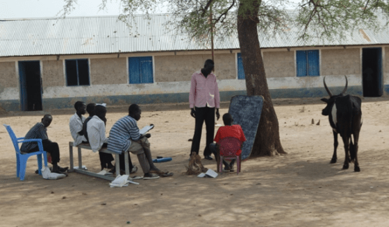 Children learning together with their cow under a shade in part of South Sudan(Photo: via Christian Mission Aid)