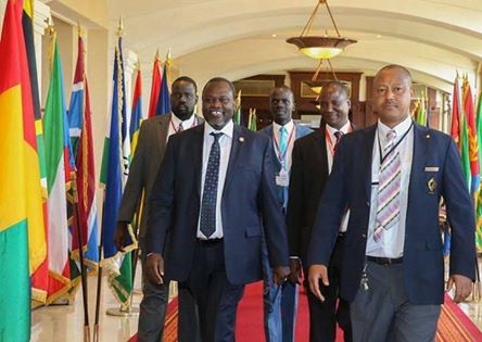 SPLM-IO's Dr. Riek Machar, Chief Negotiator Hon. Taban Deng Gai, Youth League Chairman Cde. Puot Kang Chol and Cde. Kou being led in by IGAD protocol service personel