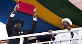 President Salva Kiir Mayardit holding the Constitution in 2011