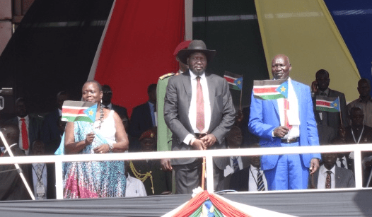 South Sudan's Salva Kiir with Dr. Anne Itto, the SPLM acting Secretary General on the stage to address a rally in Juba, South Sudan, August 18, 2015(Photo: file)