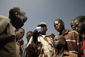 Thousands of wind-up and solar-powered blue radios distributed by NDI in Sudan are bringing a dialogue about national issues to isolated communities