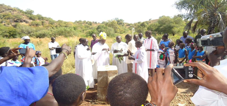 Emeritus, Paride Taban blessing St John the Baptist Church foundation stone right inside Ibonni Centre on the day of the Golden Jubilee(Photo: Iboni Parish)
