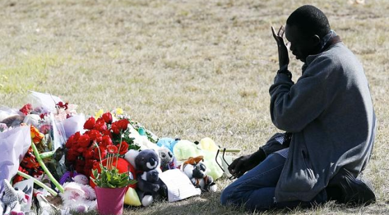 Maciek Nek, a family friend, visits the scene to pay his tributes (Photo credits: Paul Loughnan)