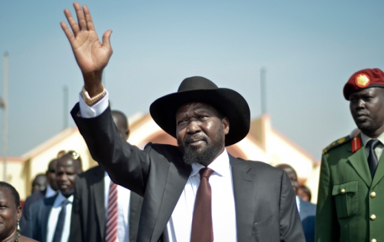 The troubled South Sudanese President, Salva Kiir Mayar, waves at a crowd on March 18, 2015 at a gov't public rally where he acknowledged the country's economic woes. Salva Kiir, who stagged a self-coup to oust his political opponent, is struggling to contain a conflict that he promised to last only three days (Photo credits: AP/Jason Patinkin)