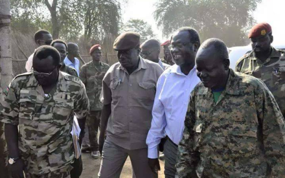 Dr. Riek Machar Teny taking a walk with his deputy Alfred Lado Gore and Gen. Gathoth Gatkuoth in Pagak, South Sudan(Photo: Profiles)