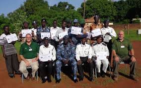 Members of South Sudan traffic police who participated in a training session posts for a picture with their trainer, Wau South Sudan(Photo credit: James Deng Dimo/Nyamilepedia)